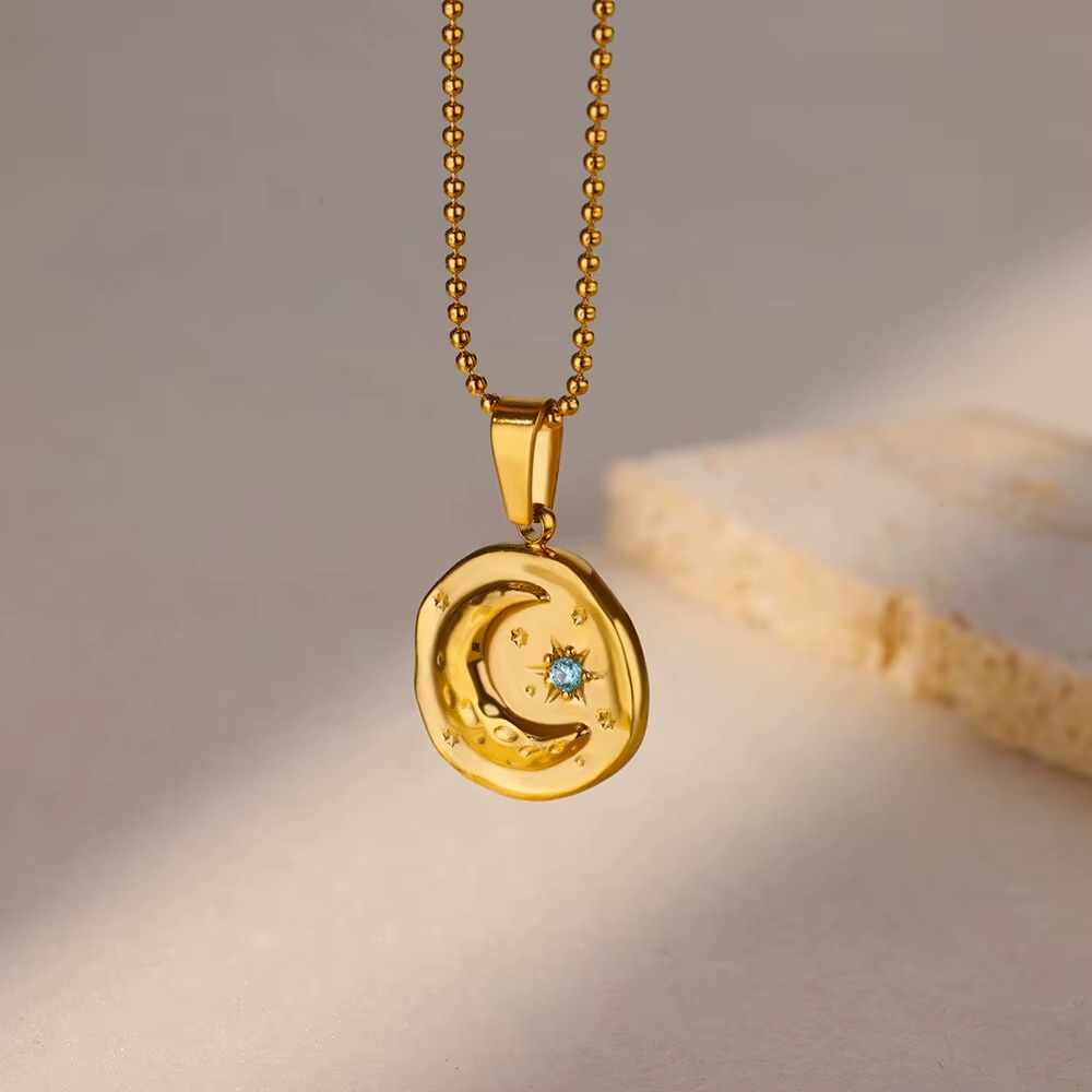 Blue Zircon Star & Moon Necklace  Gold-Tone Stainless Steel | Celestial Elegance